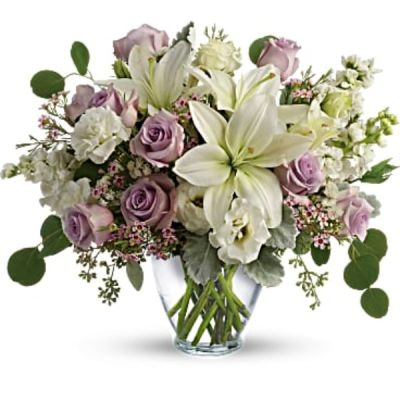 <div id="mark-2" class="m-pdp-tabs-marketing-description">Luxe in love! Pale lavender roses, creamy white lilies and delicate greens create a soft sweet bouquet that's as tender as your feelings.</div>
<div id="desc-2">
<ul>
<li>Lavender roses, white asiatic lilies, white lisianthus, white stock, lavender waxflower, and white sinuata statice are accented with dusty miller, seeded eucalyptus, and silver dollar eucalyptus.</li>
<li>Delivered in a serenity vase.</li>
</ul>
</div>